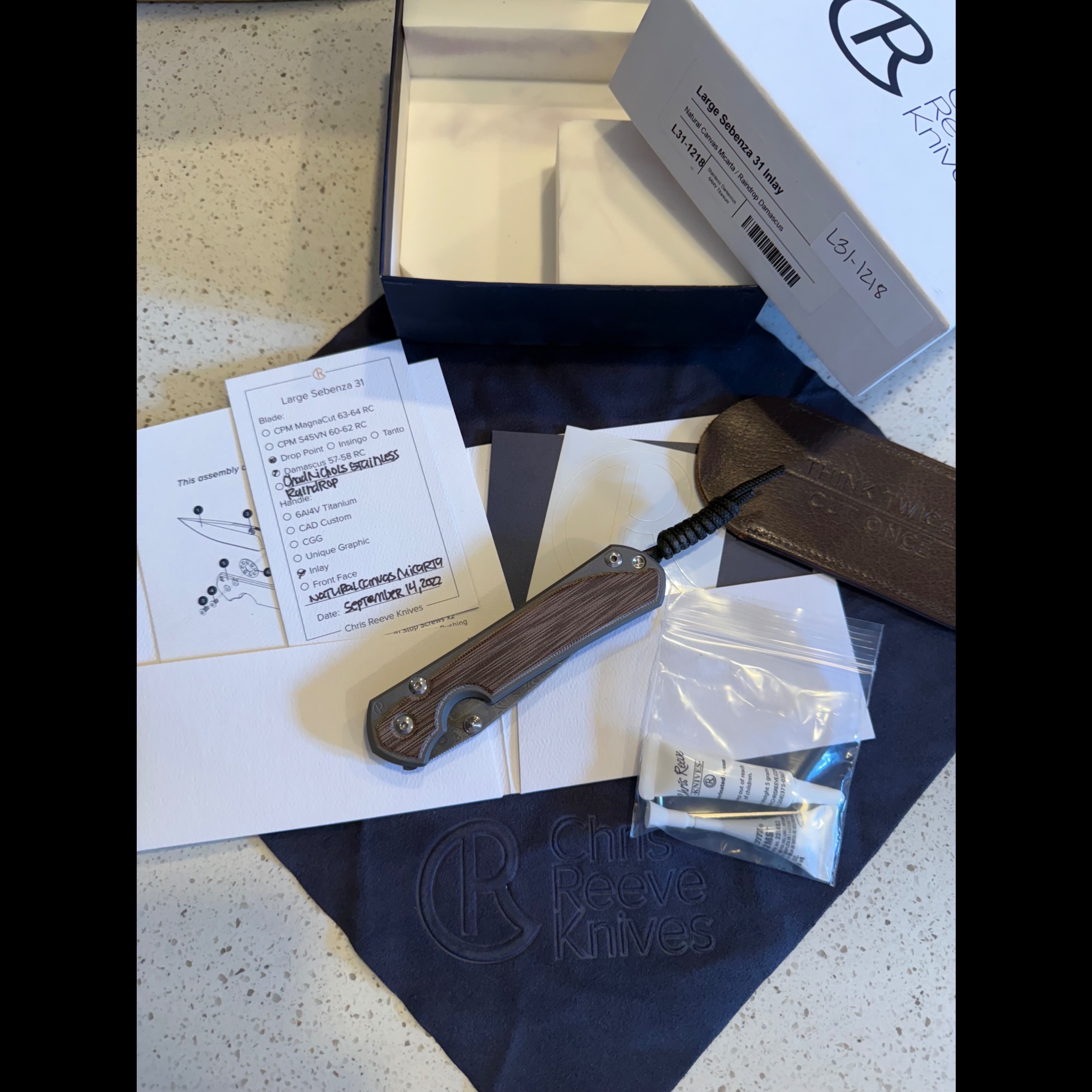 Bladebinge - *PRICE TO SELL* Large Sebenza 31 Raindrop Damascus