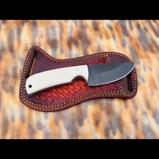 Bladebinge - Fixed-blade skinner with bone handle and tooled leather sheath